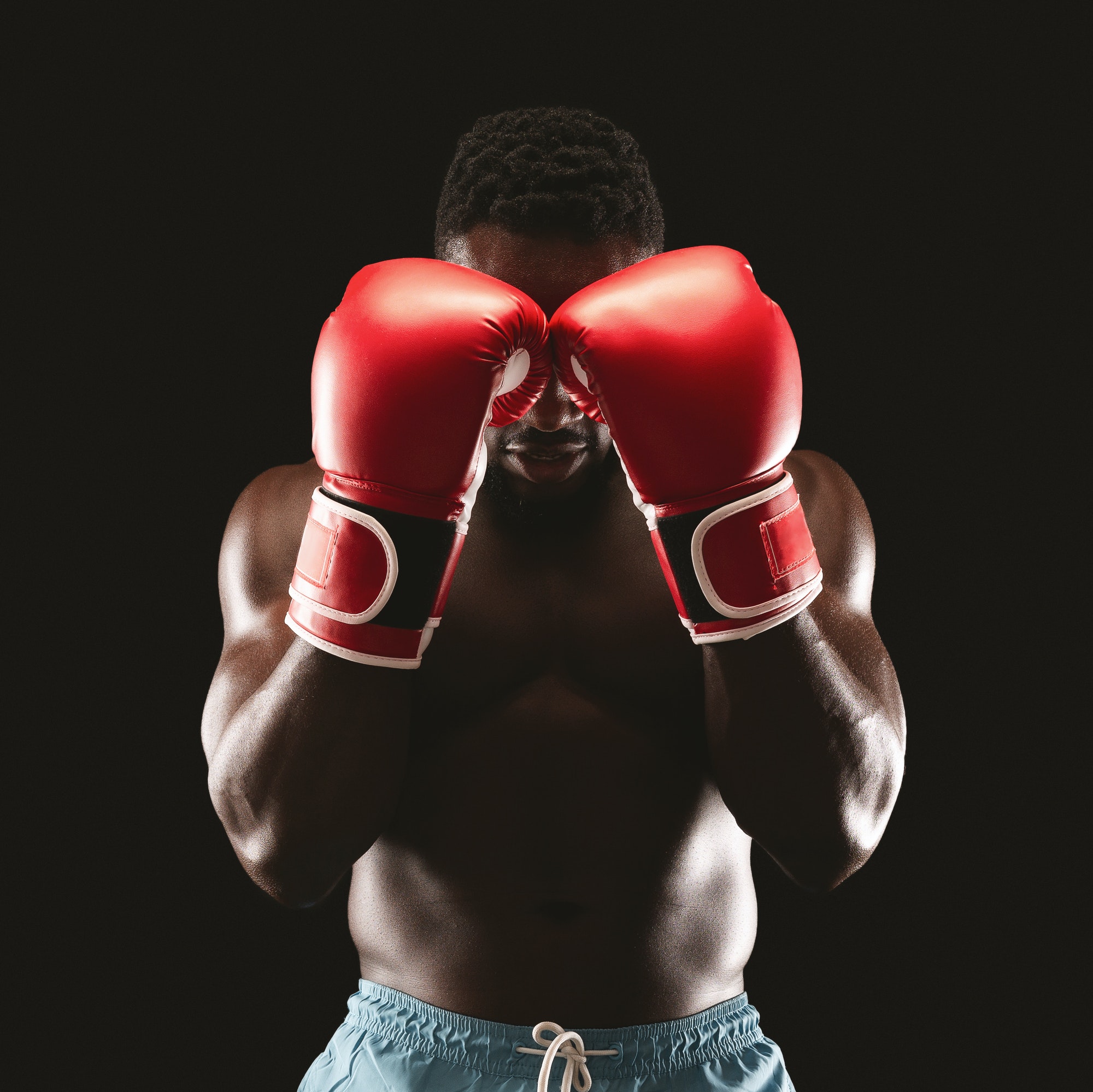 portrait-of-professional-boxer-showing-defence-pose.jpg